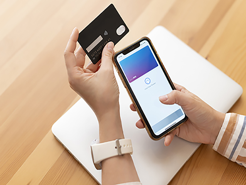 Images/Blog/SjGELcDK-person-paying-with-its-smartphone-wallet-app600.jpg